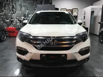 Honda  Pilot  EX  2016  SUV  Automatic  4  45,000  4WD  White  Gasoline