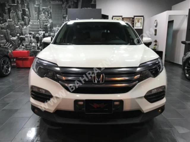 Honda  Pilot  EX  2016  SUV  Automatic  4  45,000  4WD  White  Gasoline