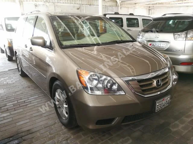 Honda  Odyssey  2010  Van / Bus  Automatic  6  90,000  FWD  Gold  Gasoline