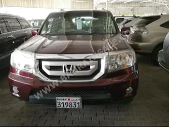 Honda  Pilot  2009  SUV  Automatic  6  100,000  4WD  Maroon  Gasoline