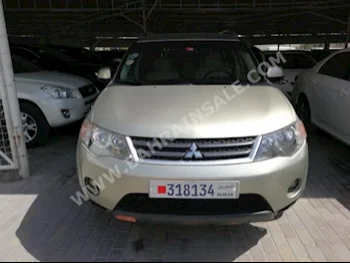 Mitsubishi  Outlander  2009  SUV  Automatic  4  12,000  FWD  Gold  Gasoline