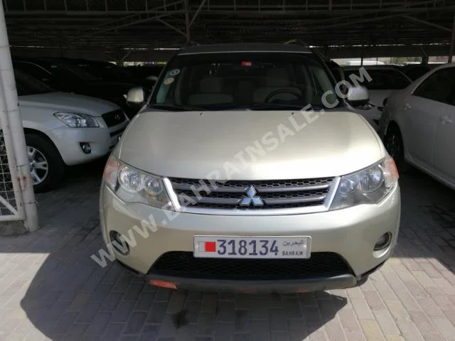 Mitsubishi  Outlander  2009  SUV  Automatic  4  12,000  FWD  Gold  Gasoline