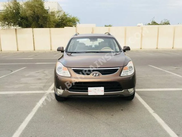 Hyundai  Veracruz  2011  SUV  Automatic  4  80,000  AWD  Maroon  Gasoline