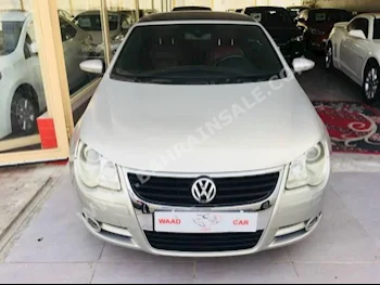 Volkswagen  Eos  2009  Convertible  Automatic  6  90,000  AWD  Silver  Gasoline