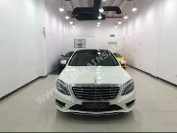 Mercedes-Benz  S-Class  400  2015  Sedan  Automatic  8  38,000  RWD  White  Gasoline