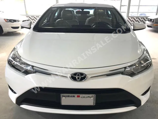 Toyota  Yaris  2015  Sedan  Automatic  4  42,000  FWD  White  Gasoline