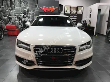 Audi  A7  3.0  2014  Sedan  Automatic  6  74,000  4WD  White  Gasoline