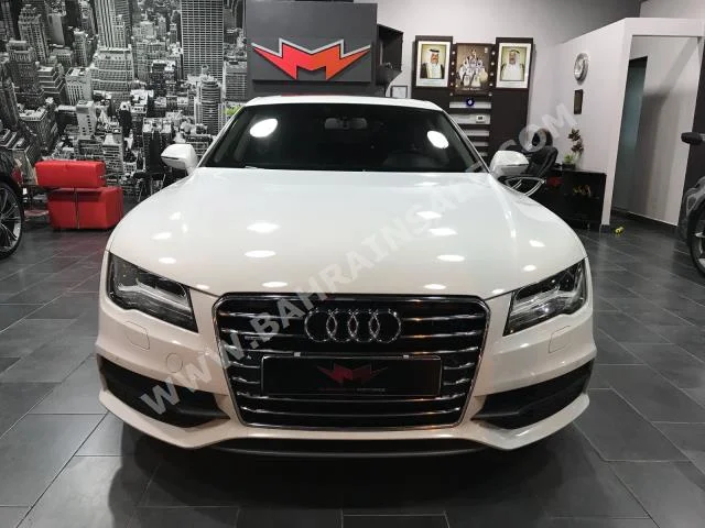 Audi  A7  3.0  2014  Sedan  Automatic  6  74,000  4WD  White  Gasoline