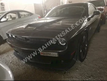 Dodge  Challenger  2015  Coupe / Sport  Automatic  8  70,000  RWD  Black  Gasoline