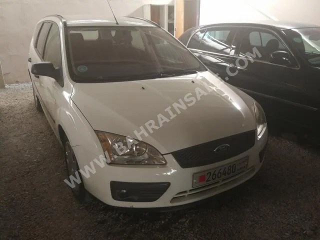 Ford  Focus  2006  Hatchback  Automatic  4  120,000  FWD  White  Gasoline
