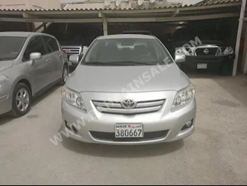 Toyota  Corolla  XLI  2010  Sedan  Automatic  4  0  FWD  Silver  Gasoline