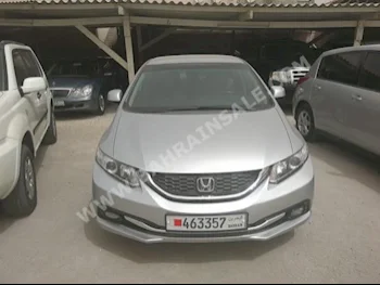 Honda  Civic  EXI  2013  Sedan  Automatic  4  125,000  FWD  Silver  Gasoline