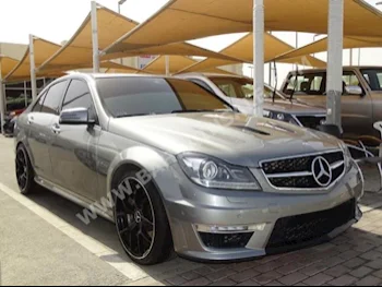 Mercedes-Benz  C-Class  63 AMG  2013  Sedan  Automatic  8  92,000  RWD  Gray  Gasoline