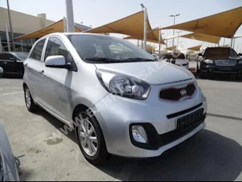 Kia  Picanto  2015  Hatchback  Automatic  4  98,000  FWD  Silver  Gasoline