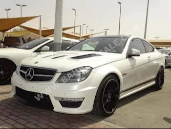 Mercedes-Benz  C-Class  63 AMG  2013  Sedan  Automatic  8  146,000  RWD  White  Gasoline