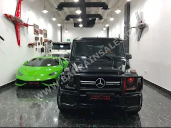 Mercedes-Benz  G-Class  55 AMG  2009  SUV  Automatic  8  115,000  4WD  Black  Gasoline