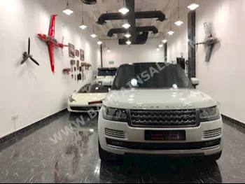 Land Rover  Range Rover  Sport SE  2014  SUV  Automatic  8  52,000  4WD  White  Gasoline