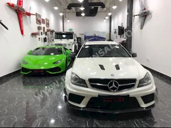 Mercedes-Benz  C-Class  63 AMG  2012  Sedan  Automatic  6  51,000  RWD  White  Gasoline