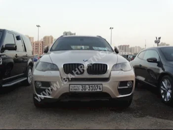 BMW  X-Series  6  2014  SUV  Automatic  6  62,000  4WD  Gold  Gasoline