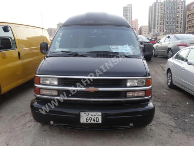Chevrolet  Express  2003  Van / Bus  Automatic  8  129,000  RWD  Black  Gasoline