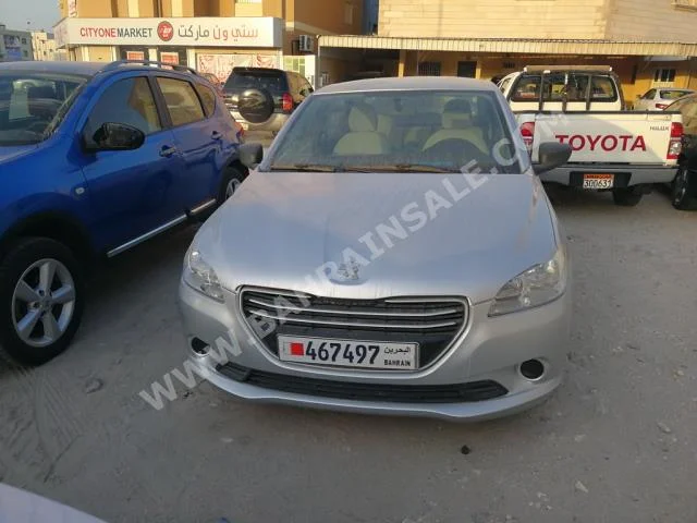 Peugeot  301  2015  Sedan  Automatic  4  65,000  FWD  Silver  Gasoline