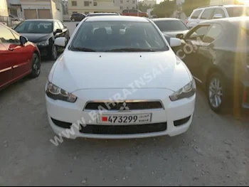 Mitsubishi  Lancer  EX  2014  Sedan  Automatic  4  124,000  FWD  White  Gasoline