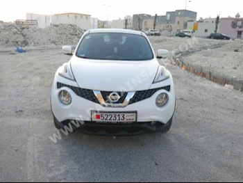 Nissan  Juke  2015  SUV  Automatic  4  48,000  FWD  Pearl  Gasoline