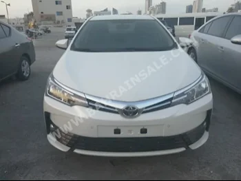 Toyota  Corolla  XLI  2017  Sedan  Automatic  4  0  FWD  White  Gasoline