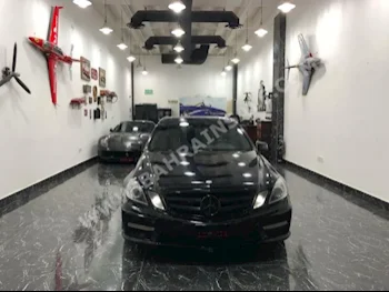 Mercedes-Benz  E-Class  63 AMG  2010  Sedan  Automatic  6  121,000  RWD  Black  Gasoline