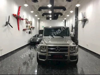 Mercedes-Benz  G-Class  55 AMG  2010  SUV  Automatic  8  78,000  4WD  Bronze  Gasoline