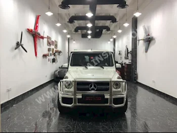 Mercedes-Benz  G-Class  63 AMG  2013  SUV  Automatic  8  124,000  4WD  White  Gasoline