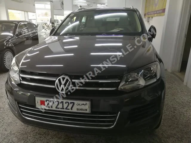 Volkswagen  Touareg  2011  SUV  Automatic  6  410,000  RWD  Gray  Gasoline