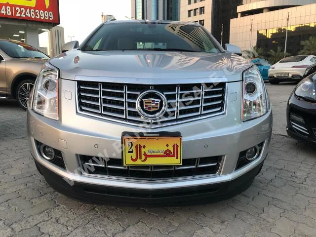 Cadillac  SRX  4  2013  SUV  Automatic  6  65,000  4WD  Silver  Gasoline