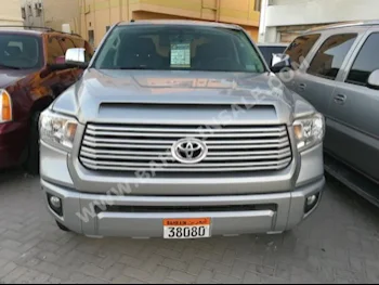 Toyota  Tundra  SR5  2013  Pick Up  Automatic  8  101,000  RWD  Silver  Gasoline