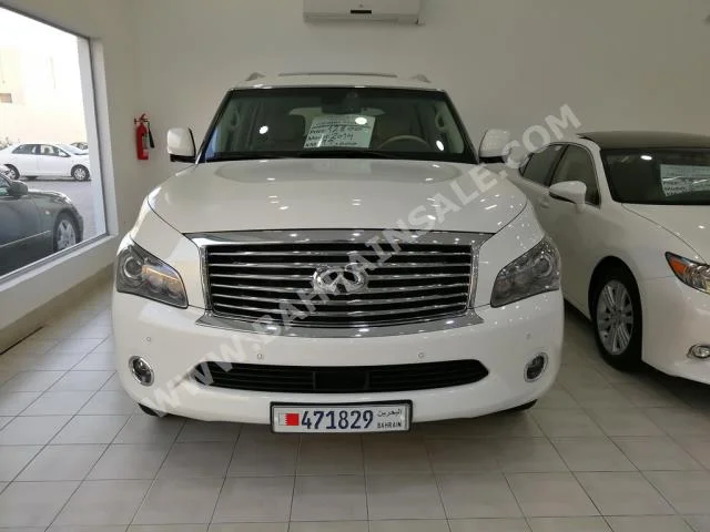 Infiniti  QX  56  2014  SUV  Automatic  8  99,000  4WD  Pearl  Gasoline