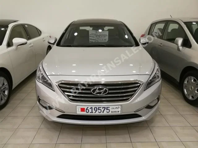 Hyundai  Sonata  2015  Sedan  Automatic  4  58,000  FWD  Silver  Gasoline