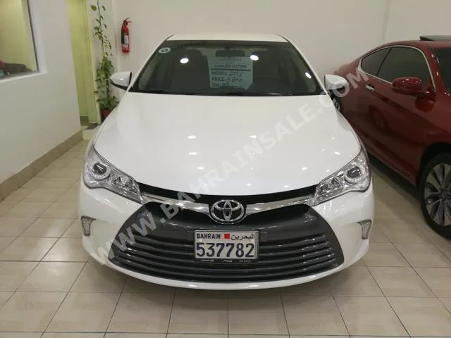 Toyota  Camry  GLX  2016  Sedan  Automatic  4  38,000  FWD  Pearl  Gasoline