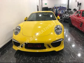 Porsche  911  Carrera S  2012  Coupe / Sport  Automatic  6  127,000  RWD  Yellow  Gasoline