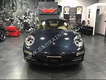 Porsche  911  Carrera 4  2009  Coupe / Sport  Automatic  6  54,000  RWD  Gray  Gasoline