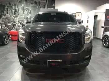 GMC  Yukon  2015  SUV  Automatic  8  43,000  4WD  Gray  Gasoline