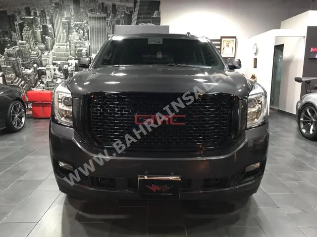 GMC  Yukon  2015  SUV  Automatic  8  43,000  4WD  Gray  Gasoline