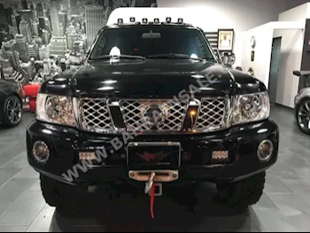 Nissan  Patrol  SGL  2013  Pick Up  Automatic  6  37,000  4WD  Black  Gasoline