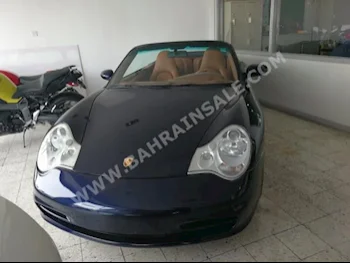 Porsche  911  Carrera  2003  Convertible  Automatic  6  98,000  AWD  Dark Blue  Gasoline