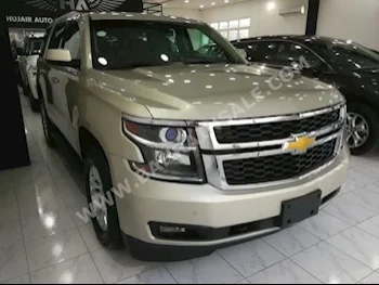 Chevrolet  Tahoe  LS  2015  SUV  Automatic  8  49,000  RWD  Gold  Gasoline