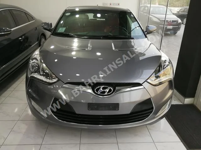 Hyundai  Veloster  2015  Hatchback  Automatic  4  50,000  FWD  Gray  Gasoline