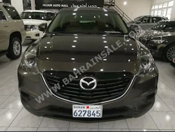 Mazda  CX  9  2015  SUV  Automatic  6  49,000  FWD  Gray  Gasoline