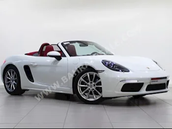Porsche  Boxster  2018  Convertible  Automatic  6  6,000  RWD  White  Gasoline