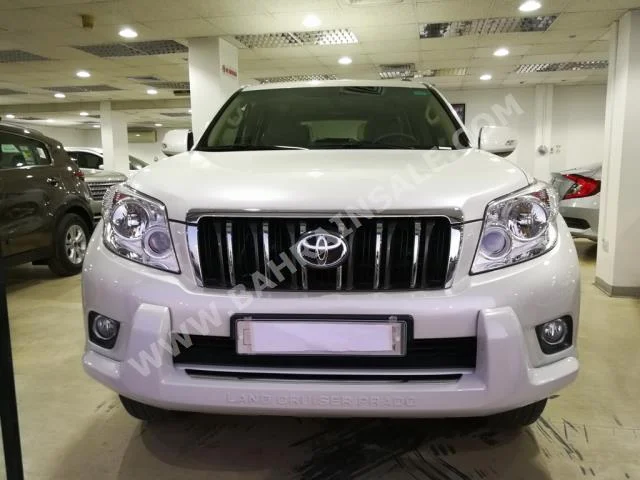 Toyota  Prado  TXL  2012  SUV  Automatic  6  16,000  4WD  Pearl  Gasoline