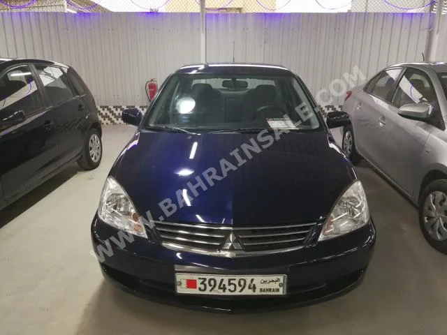 Mitsubishi  Lancer  2014  Sedan  Automatic  4  52,000  FWD  Dark Blue  Gasoline
