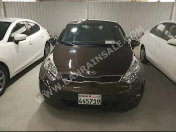 Kia  Rio  2013  Hatchback  Automatic  4  75,000  FWD  Brown  Gasoline